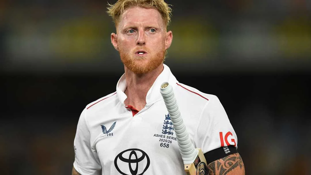 England captain Ben Stokes holding his bat in Test whites during a period of uncertainty over his leadership future and the team's curfew policy