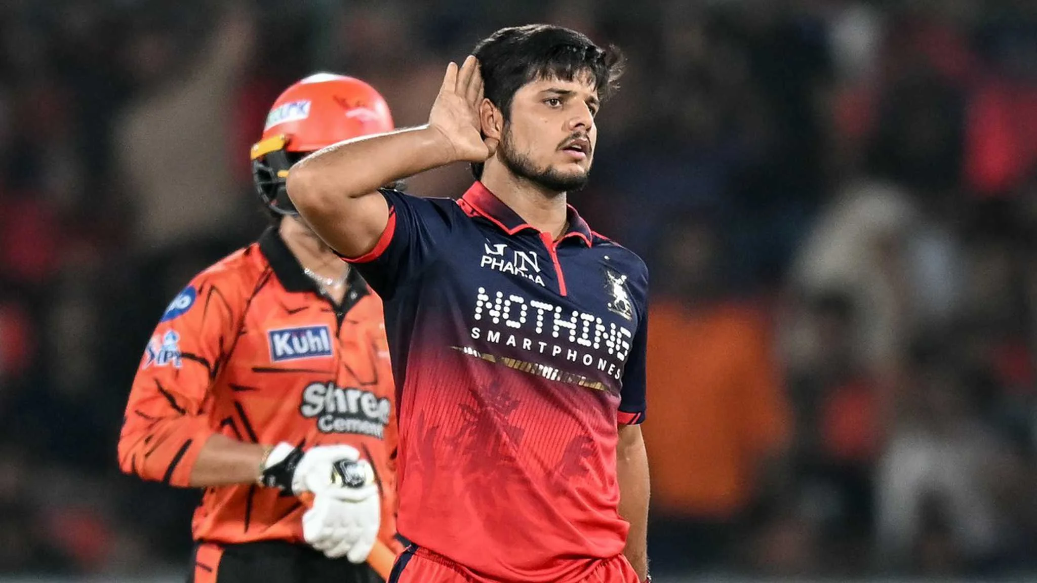 Rasikh Salam Dar with RCB pace attack learning from Bhuvneshwar Kumar Josh Hazlewood and Jacob Duffy during IPL 2026, Guru News Network